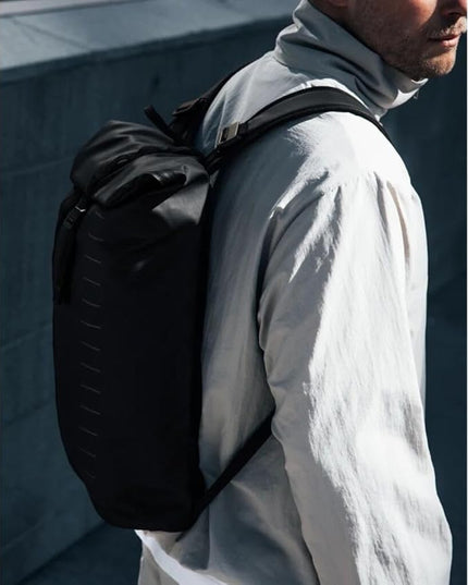 Db Journey Essential Backpack - Travel Backpack with Laptop Compartment for Work, and Gym, Lightweight, Roller Bag Attachment, 12L - Black Out