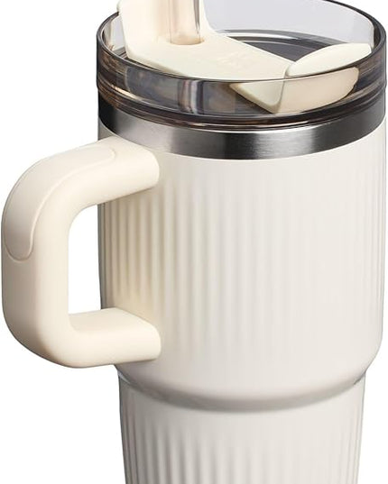 STANLEY Quencher H2.0 Tumbler with Handle and Straw 20 oz | Flowstate 3-Position Lid | Cup Holder Compatible for Travel | Insulated Stainless Steel Cup | BPA-Free | Fluted Cream Gloss