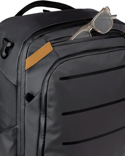 Käydä 44L Travel Backpack - Spacious Carry On Backpack with Detachable Travel Pouch, Magnetic Water Bottle Pocket, Passport and Laptop Pocket - Convertible Boot Bag for Snow Sports (Black/Gold)