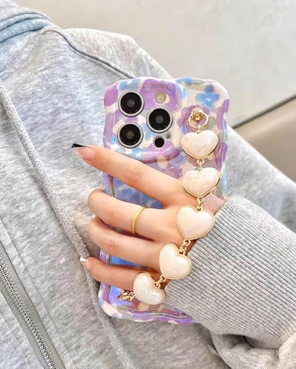 Compatible with iPhone 13 Pro Max Case Soft TPU Sparkling Purple Flower Oil Painting, with Luxury Heart Bracelet, Fashionable Wave Edge Shape, Drop and Shock Resistant, for Women and Girls