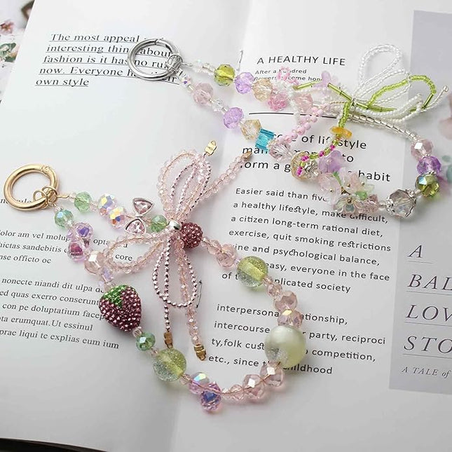 Phone Charm Wrist Strap with Diamond Inlay, Strawberry Bow & Crystal Flower Design for iPhone, Kindle, Camera, Pink Purple Green Key Wristlet, Lanyard for womens keychain wristlet