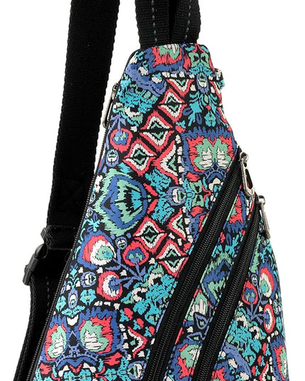 Sakroots On The Go Sling Bag for Women in Eco-Twill, Large Convertible Crossbody Backpack With Main Zipper Closer, Made From Recycled Materials - Denim Flower Garden