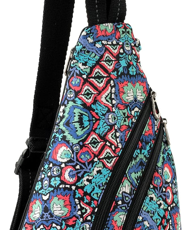 Sakroots On The Go Sling Bag for Women in Eco-Twill, Large Convertible Crossbody Backpack With Main Zipper Closer, Made From Recycled Materials - Denim Flower Garden