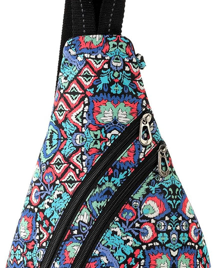 Sakroots On The Go Sling Bag for Women in Eco-Twill, Large Convertible Crossbody Backpack With Main Zipper Closer, Made From Recycled Materials - Denim Flower Garden