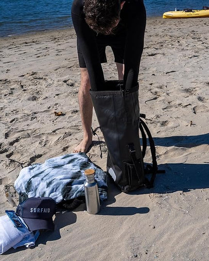 Ho Stevie! Waterproof Surf Backpack - Heavy Duty with Laptop Sleeve - Roll Top Closure Keeps Your Gear Dry In Bag - 25L