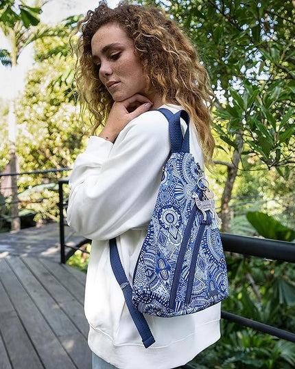 Sakroots On The Go Sling Bag for Women in Eco-Twill, Large Convertible Crossbody Backpack With Main Zipper Closer, Made From Recycled Materials - Rainbow Wanderlust